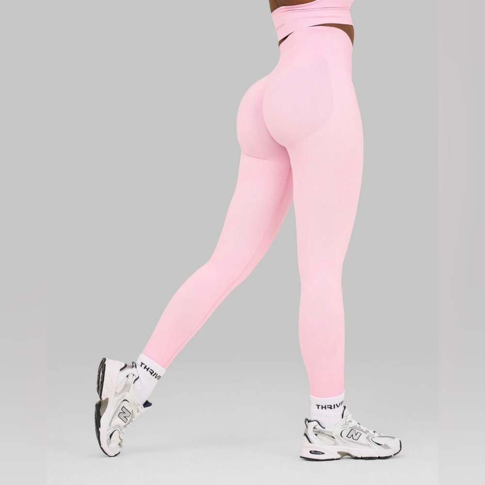 Brand new tags on Thrivin Gym wear best butt shape leggings and tank top set.